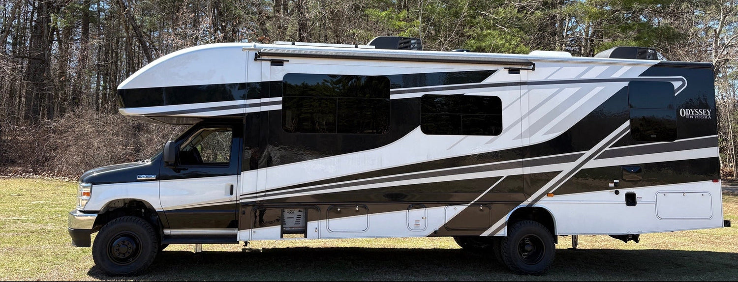 Motorhome parked in a wooded area